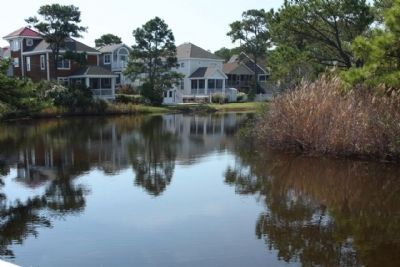 view of a portion of the Bethany Beach Loop Canal , near the marker, seen today image. Click for full size.