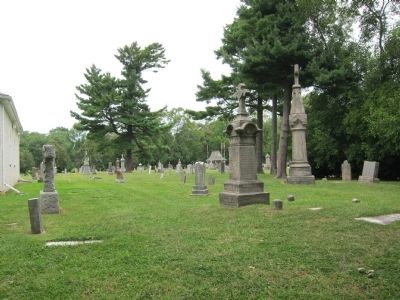 View of St. Vincent de Paul cemetery - behind church, as seen from Picton St. image. Click for full size.