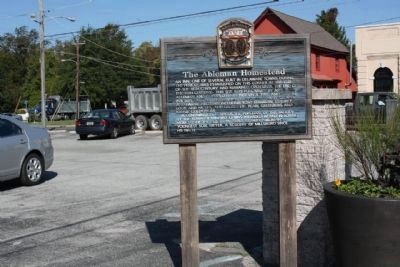 The Ableman Homestead (and Marker) as a city parking lot today. Click for full size. The Ableman Homestead (and Marker) as a city parking lot today image. Click for full size.