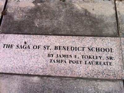 The Saga of St. Benedict School (engraved in sidewalk) image. Click for full size.