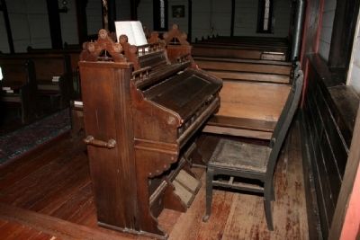 An Old Pump Organ Still Provides Music For This Church. image. Click for full size.