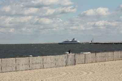 Cape May- Lewes Ferry seen along with Breakwater East End Lighthouse in background image. Click for full size.