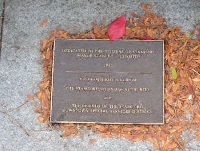 Plaque behind the Statue image. Click for full size.