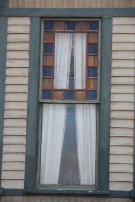 One of the colorfull windows on the Gunn-Bellenger House image. Click for full size.