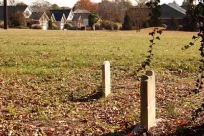 Saluda Factory Cemetery Marker (Background) , last remaining visible headstones seen here image. Click for full size.