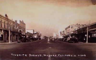 Old post card of the Intersection of Yosemite Avenue and E Street in Madera image. Click for full size.