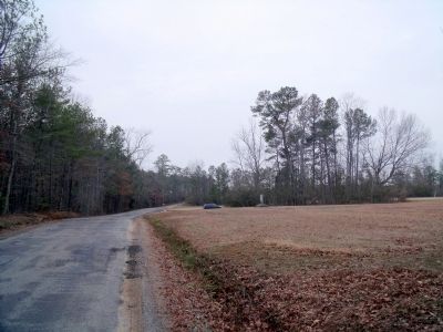 Comans Well Rd & Tyus Ln (facing west) image. Click for full size.