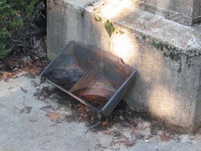 Buckets Displayed at the Bottom of the Monument. Click for full size. Buckets Displayed at the Bottom of the Monument image. Click for full size.