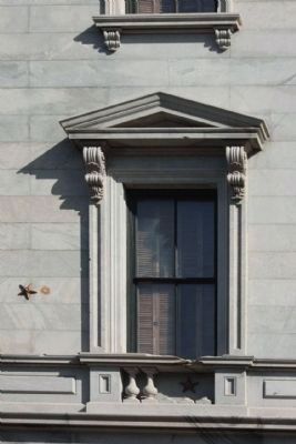The State House west wall window showing Union 2 cannonball strkes, indicated by "stars" image. Click for full size.