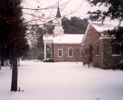 Bluffton United Methodist Church snow covered the church grounds image. Click for full size.