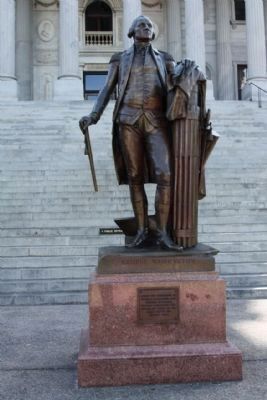 The State House George Washington Statue, north steps reads: image. Click for full size.