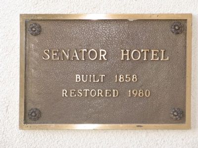 Plague Mounted on the Senator Hotel Building. Click for full size. Plague Mounted on the Senator Hotel Building image. Click for full size.