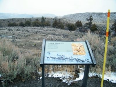 Wildlife Migrations Marker with Gardner River Valley in the background. Click for full size. Wildlife Migrations Marker with Gardner River Valley in the background image. Click for full size.