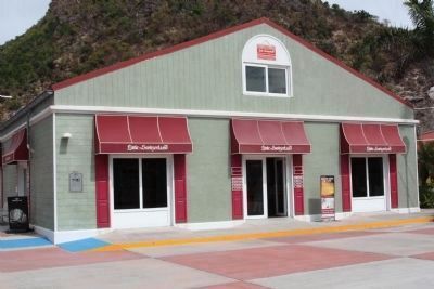 Marker, at left, seen on reproduced building here using modern techniques and material. Click for full size. Marker, at left, seen on reproduced building here using modern techniques and material image. Click for full size.