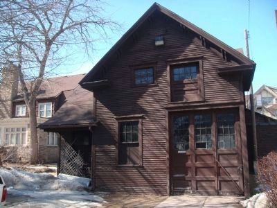 Carriage House and Latticed Well Cover. Click for full size. Carriage House and Latticed Well Cover image. Click for full size.