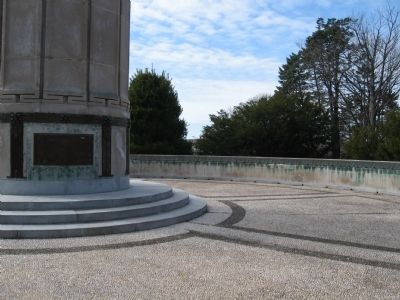 Bronze plaques along the rim of the wall. Click for full size. Bronze plaques along the rim of the wall image. Click for full size.