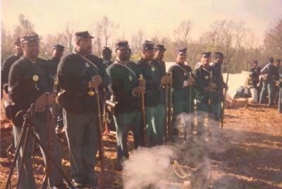 Black Civil War re-enactors from the District of Columbia muster in camp prior to re-staging. Click for full size. Black Civil War re-enactors from the District of Columbia muster in camp prior to re-staging image. Click for full size.