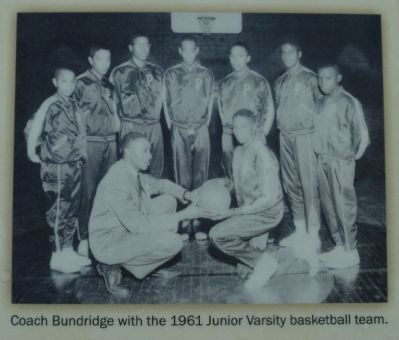 Coach Bundrige with the 1961 Junior Varsity basketball team image. Click for full size.