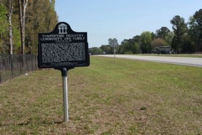Turpentine Industry Community and Family Marker, looking northeast along State Road 24 image. Click for full size.