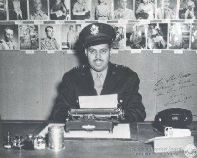 Frank Bolden sitting in front of his typewriter. Click for full size. Frank Bolden sitting in front of his typewriter image. Click for full size.