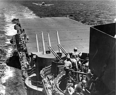 Hellcat fighter landing on "Lady Lex" (CV-16) during Battle of the Philippine Sea, 19 June, 1944. image. Click for full size.