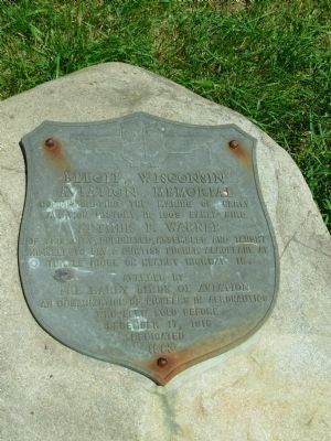 Plaque on rock at base of marker image. Click for full size.