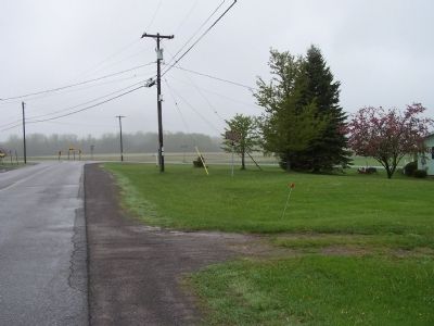 Braggs Corners Marker seen in the distance image. Click for full size.