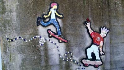 Skateboarders on Mosaic Wall. Click for full size. Skateboarders on Mosaic Wall image. Click for full size.
