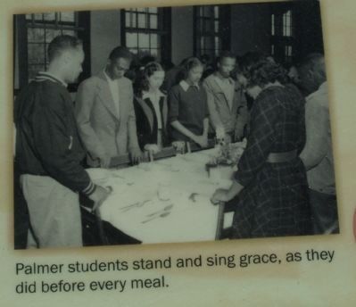 Students stand and sing grace, as they did before every meal. image. Click for full size.