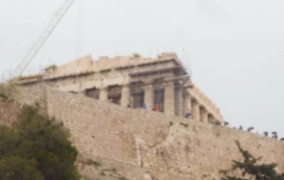 View of the Parthenon above the Acropolis wall from Dionysiou Areopagitou Street. Click for full size. View of the Parthenon above the Acropolis wall from Dionysiou Areopagitou Street image. Click for full size.
