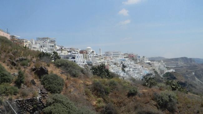View from the cable car toward Fira village, perched on the high crest of Santorini mountain. Click for full size. View from the cable car toward Fira village, perched on the high crest of Santorini mountain image. Click for full size.