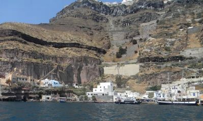 The cable car line from the crest to the lower station (painted white) on the waterfront below Fira. Click for full size. The cable car line from the crest to the lower station (painted white) on the waterfront below Fira image. Click for full size.