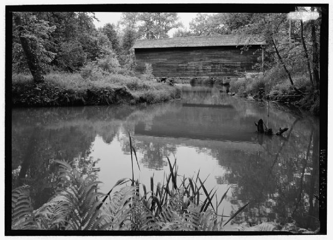 Hyde Hall Covered Bridge spans the placid Shadow Brook image. Click for full size.