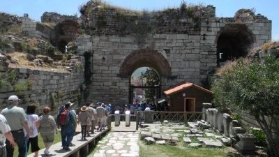 The Basilica of St. John - visitors exiting the ancient ruins via the Roman portal to the south. Click for full size. The Basilica of St. John - visitors exiting the ancient ruins via the Roman portal to the south image. Click for full size.