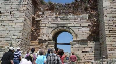 Visitors outside the Roman portal. Click for full size. Visitors outside the Roman portal image. Click for full size.