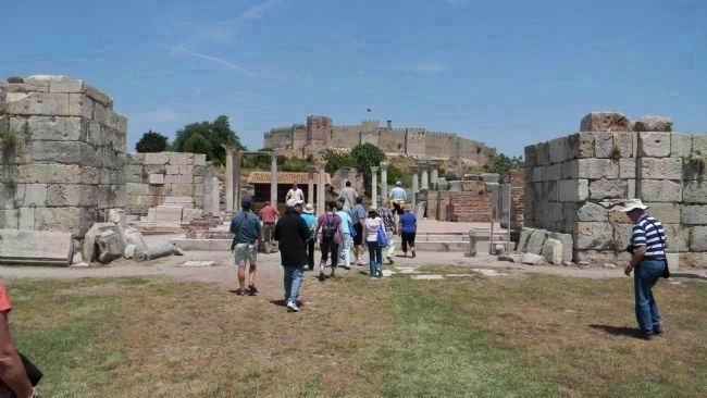 Ruins of the ancient basilica with the medieval fortifications on Ayasoluk Hill in the background. Click for full size. Ruins of the ancient basilica with the medieval fortifications on Ayasoluk Hill in the background image. Click for full size.