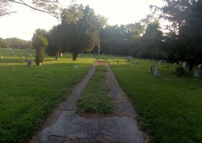 Road leading through the cemetery image. Click for full size.