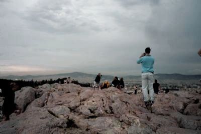 Tourists on the marble outcrop, Areopagus Hill, Athens image. Click for full size.