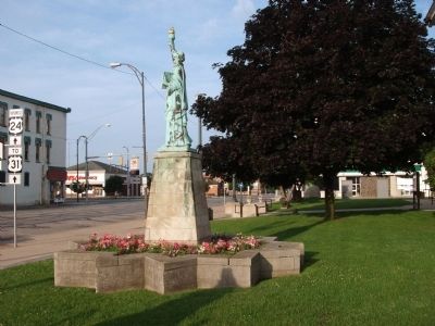 Looking West - - Replica of The State of Liberty Marker. Click for full size. Looking West - - Replica of The State of Liberty Marker image. Click for full size.