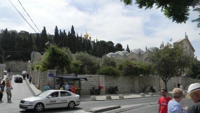 Jerico Road with the Garden of Gethsemane and the Basilica behind the stone wall. Click for full size. Jerico Road with the Garden of Gethsemane and the Basilica behind the stone wall image. Click for full size.