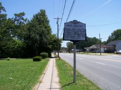Dred Wimberly Marker, looking east along North Raleigh Street, US 64 image. Click for full size.