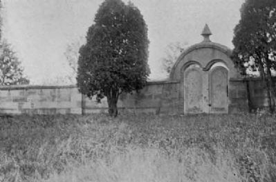 This wall and a pivoting stone gate define the perimeter of the Harmonist Society's cemetery. Click for full size. This wall and a pivoting stone gate define the perimeter of the Harmonist Society's cemetery image. Click for full size.