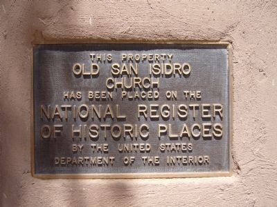 Plaque to the left of Iglesia De San Ysidro entrance image. Click for full size.
