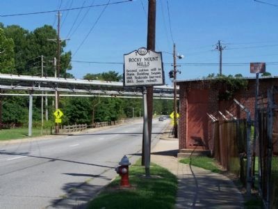 Rocky Mount Mills Marker, looking northbound on Falls Road. Click for full size. Rocky Mount Mills Marker, looking northbound on Falls Road image. Click for full size.