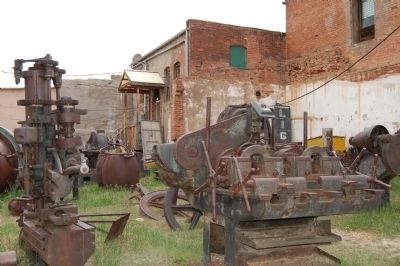 The Victor Lowell Thomas Museum mining machinery exhibit image. Click for full size.
