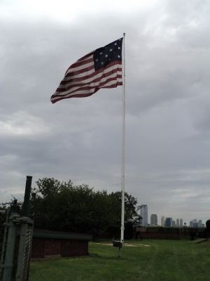 Flag and Cannon in Fort Jay image. Click for full size.