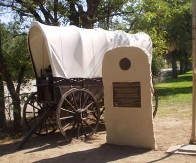 Givens Hot Springs Marker next to Covered Wagon. Click for full size. Givens Hot Springs Marker next to Covered Wagon image. Click for full size.