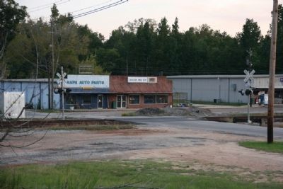 Additional buildings across the railroad tracks in downtown Pine Hill, Alabama. image. Click for full size.