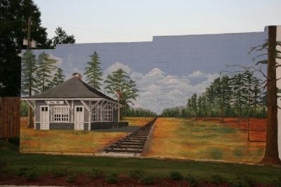 Mural of the Pine Hill Depot on the side of building next to the municipal park. image. Click for full size.