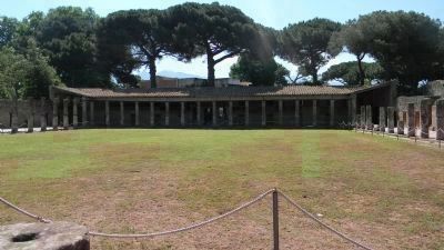 Quadriporticus: the Great Theatre's portico and courtyard, in use as a barracks and practice field image. Click for full size.